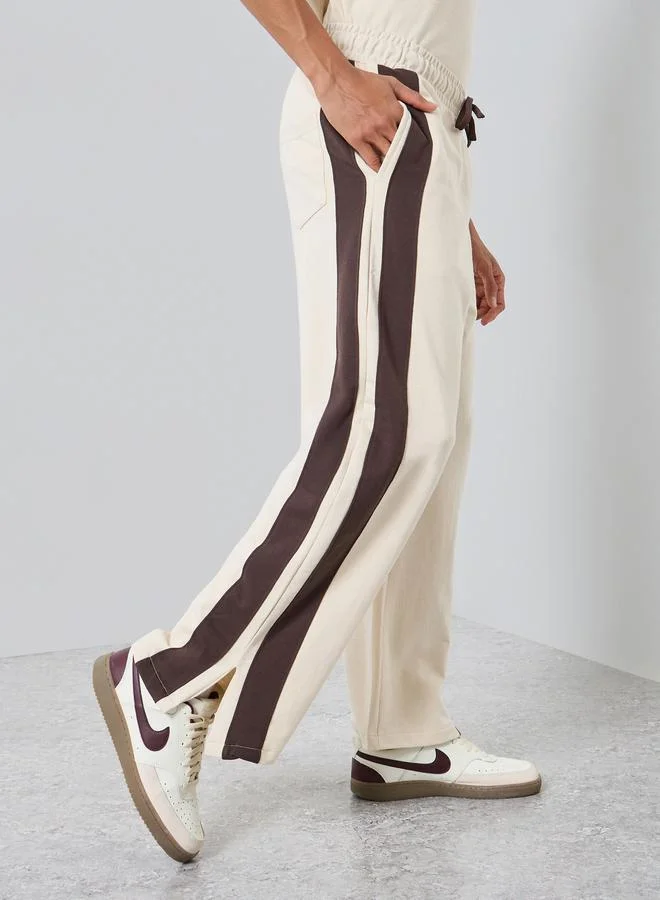 Styli Men Beige Striped Relaxed Joggers